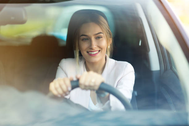 istock Woman driving a car 1036831148