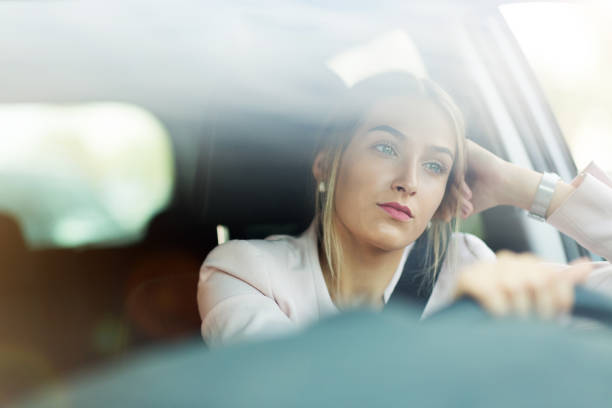 istock Woman driving a car 1036831218