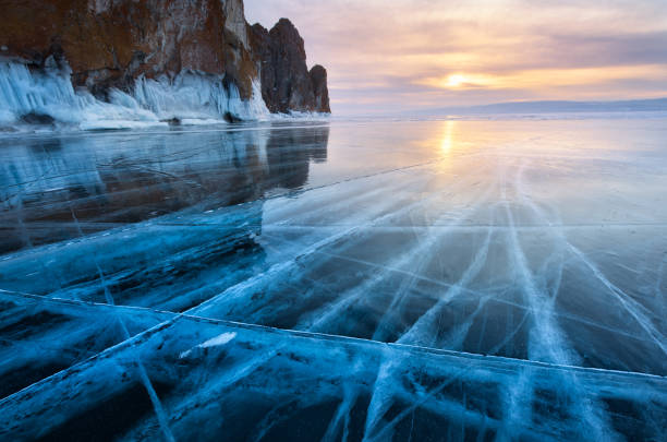 ice with cracks in lake baikal in winter.natural landscape of baikal, russia - lake baikal lake landscape winter imagens e fotografias de stock