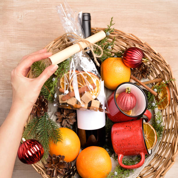 istock Bottle of red wine in gift basket. 1036850978