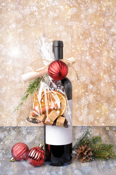 istock Gift Bottle of wine on wooden table. 1036850982