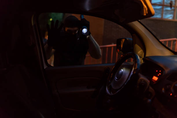 istock Car Burglar Stealing the Vehicle 1036851354