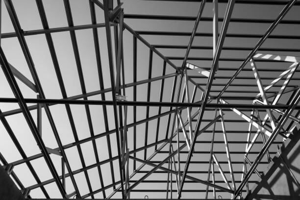 istock Structure of steel roof frame for building construction. 1036857110