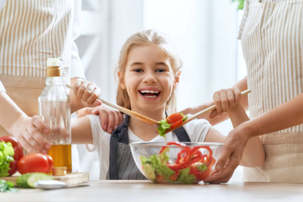 istock Happy family in the kitchen 1036857674