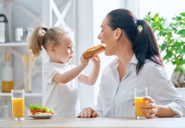 istock Happy family in the kitchen 1036857820