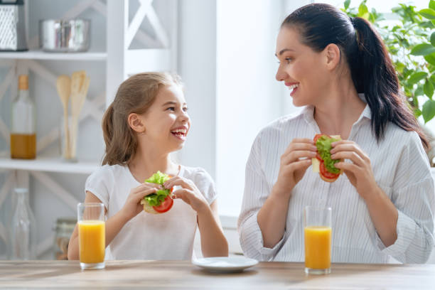istock Happy family in the kitchen 1036857872