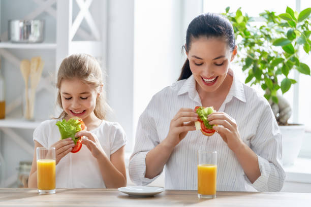 istock Happy family in the kitchen 1036857972
