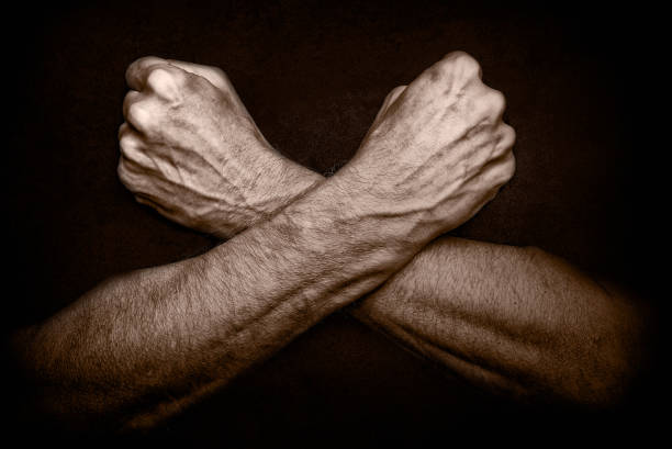 Man with crossed arms stock photo