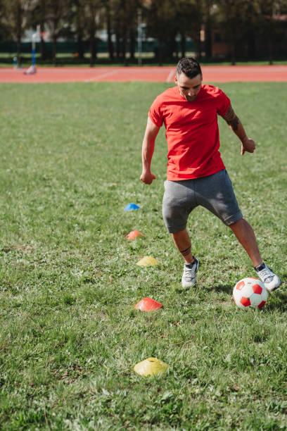 istock Young adult man during a soccer training 1036876476