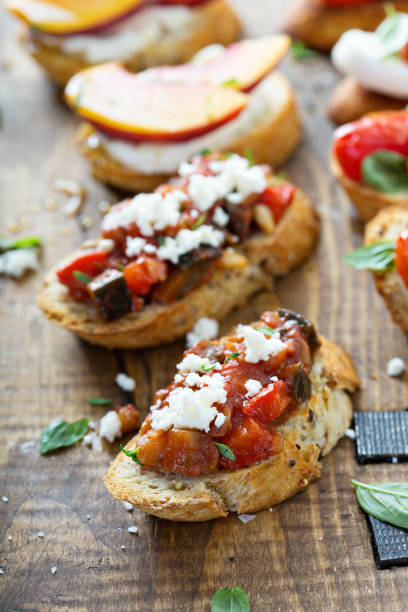 istock Crostini or bruschetta board with eggplant caponata 1036879906