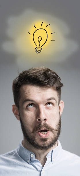 istock Man is looking reminiscing. Over gray background 1036881586