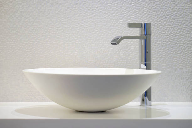 Bathroom interior sink with modern design. Interior of bathroom with washbasin and faucet