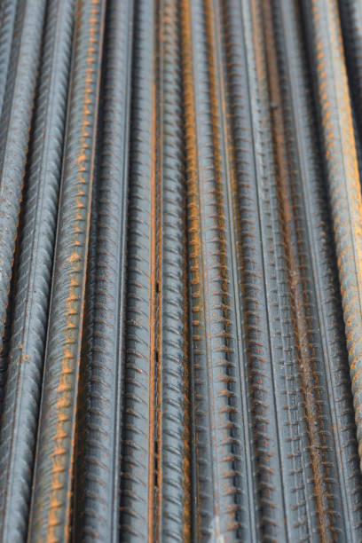 istock reinforcing steel bar stack, rebar for concrete construction closeup 1036893522