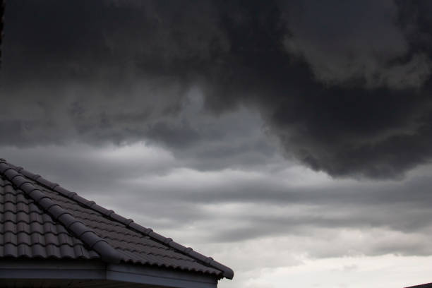 istock Dark storm clouds before rain, Motion black cloud in summer. 1036897124
