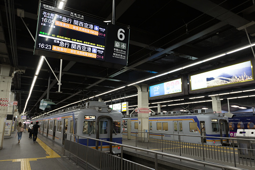 Osaka, Japan - August 30, 2018 : People at Namba Station in Osaka, Japan. This train is operated by Nankai Electric Railway going to Kansai International Airport Station.
