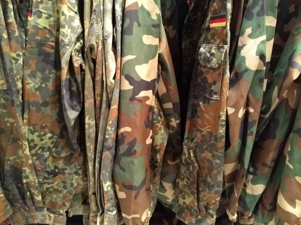 istock Military clothing in camouflage pattern 1036902162