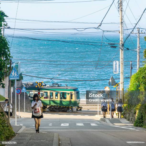 Enoshima Electric Railway And High School Girl Stock Photo - Download Image Now - Enoshima Island, Enoshima Electric Railway, Japan