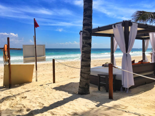 istock Luxury deck chairs on the beach in Playa de Carmen 1036926888