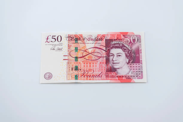 Fifty Pound Note Fifty pound note on the white background. british currency stock pictures, royalty-free photos & images