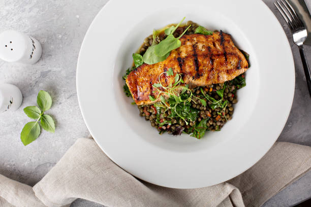 istock Grilled salmon with lentils and swiss chard 1036965594
