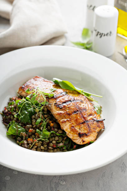 istock Grilled salmon with lentils and swiss chard 1036965596