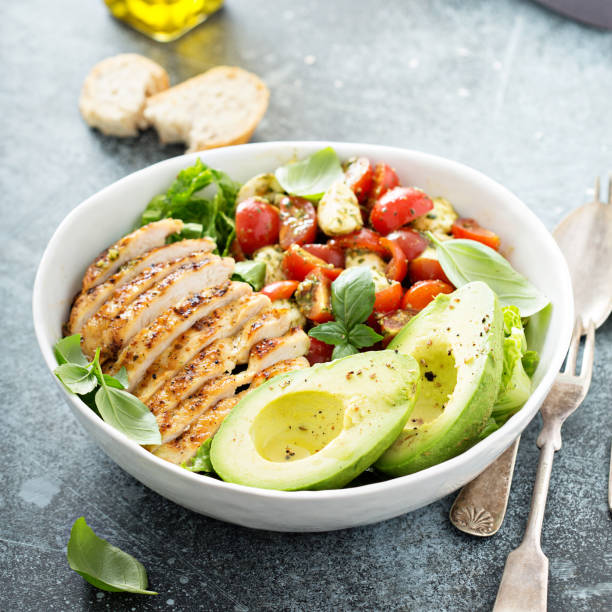 istock Caprese lunch bowl with grilled chicken 1036965944