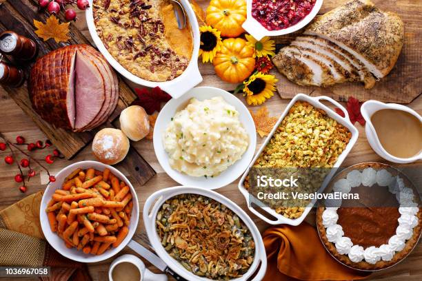 Thanksgiving Table With Turkey And Sides Stock Photo - Download Image Now - Thanksgiving - Holiday, Food, Dinner