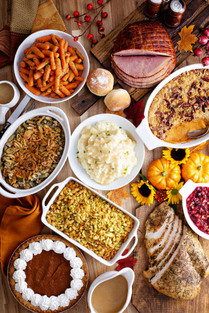 istock Thanksgiving table with turkey and sides 1036967148