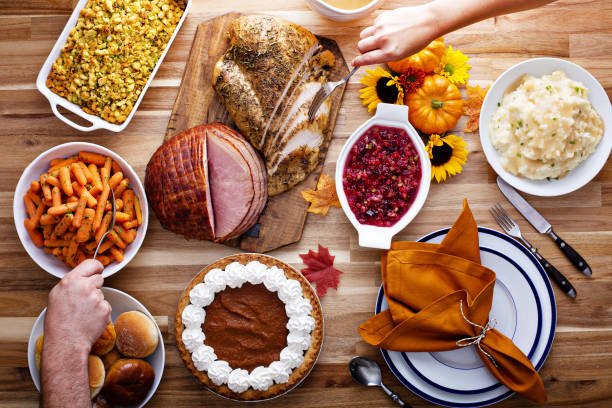 istock Thanksgiving table with turkey and sides 1036967324