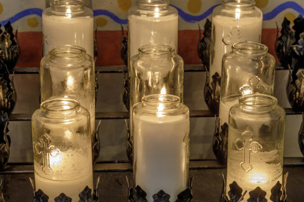 istock Burning votive candles in a church 1036967710
