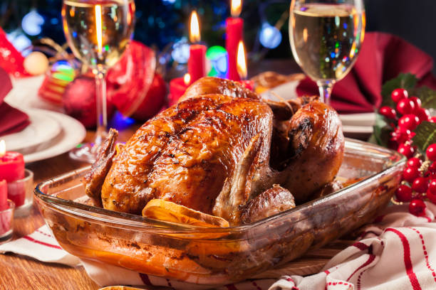 istock Baked or roasted whole chicken on Christmas table 1036979628