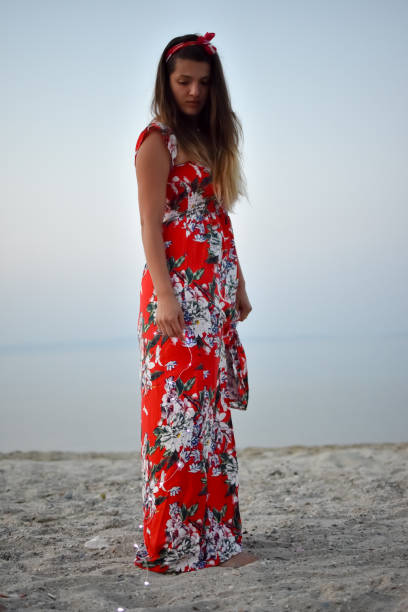 istock Young woman on beach 1036980422