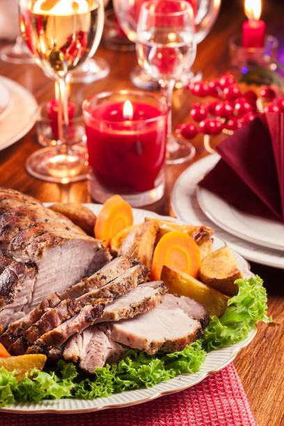 istock Roasted pork loin with baked potatoes 1036981662