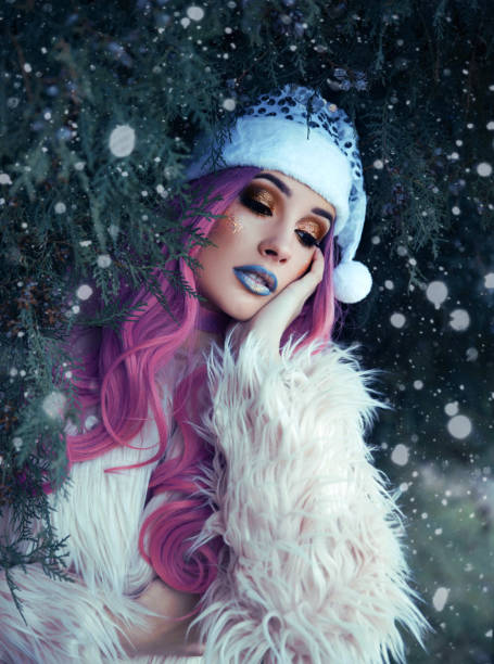 istock Young woman with Santa hat 1036983920