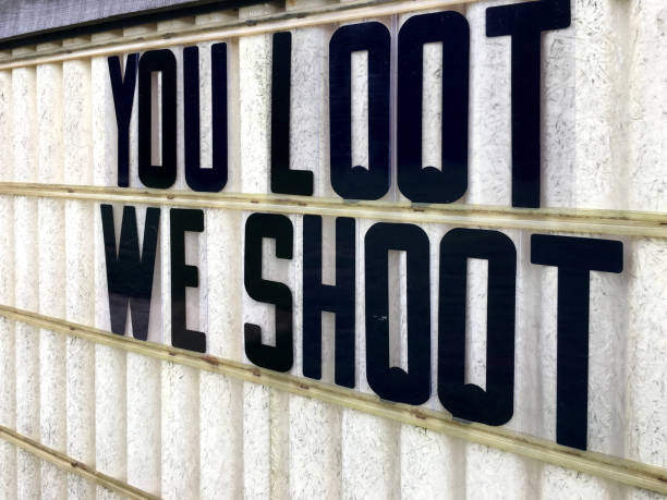 istock Loot We’ll Shoot Warning Sign for Hurricane Florence 2018 1036985848