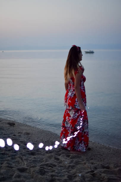 istock Young woman on beach 1036989266