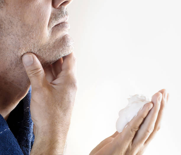 istock Mature stubble man preparing to shave 1036999532