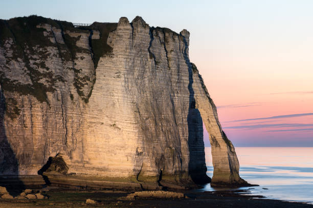 istock Chalk cliffs of Etretat (Normandy France) 1037003572