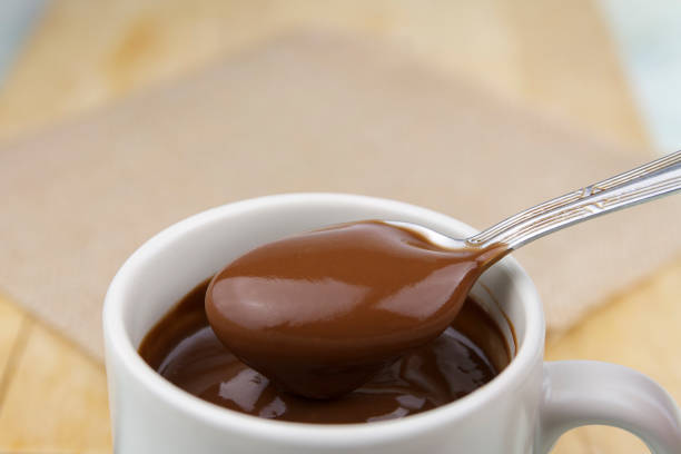 istock Spoon of hot chocolate 1037007754