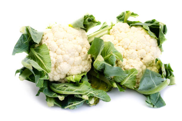 istock Two whole cauliflower isolated on white background 1037008086