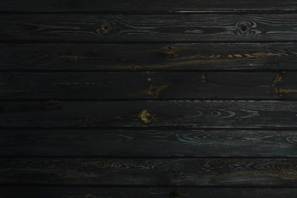 istock dark natural wooden surface old desk texture background, wood planks grunge wall pattern top view 1037008330