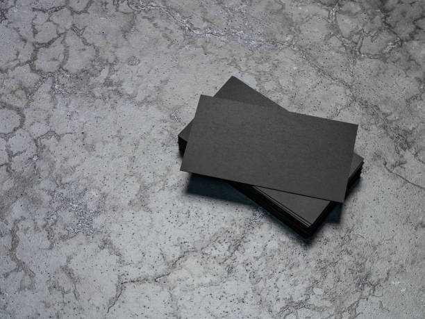 istock Set of black cards on concrete background 1037018468