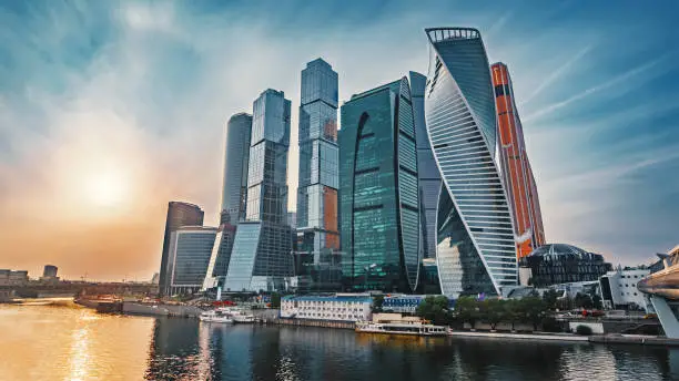 Panoramic view of Moscow city and Moskva River at sunset. New modern futuristic skyscrapers of Moscow-City - International Business Center, toned