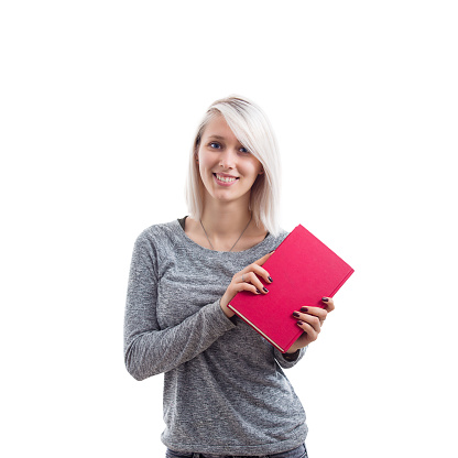 Cheerful woman holding a red book show the cover to camera. Book presentation isolated on white background.