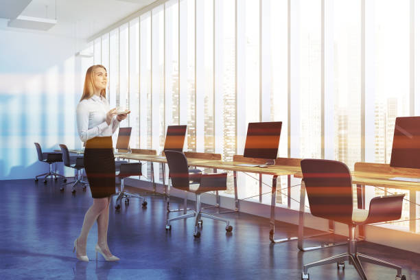 istock Cityscape company office interior side view, woman 1037040048