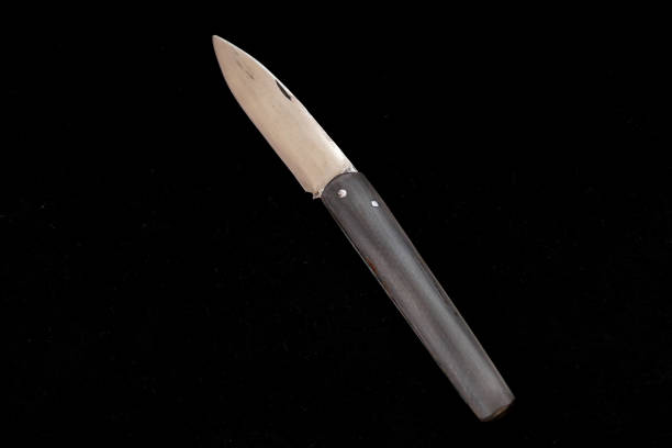 istock a person who controls a pocket knife. a special turkish knife. 1037043916