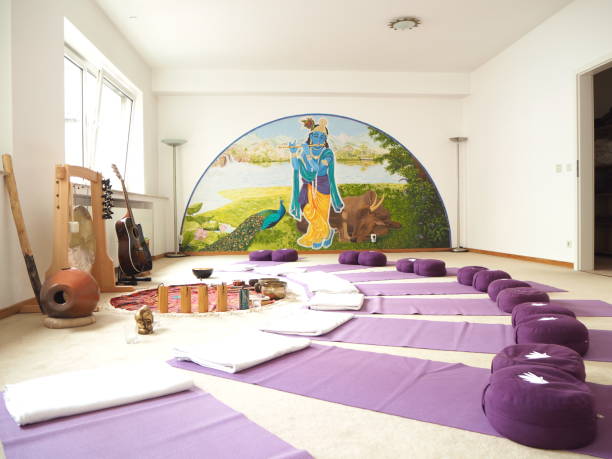 Sound therapy set up with different sound instruments and yoga mats around. stock photo