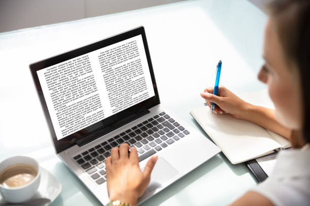 istock Businesswoman Reading Information On Laptop 1037076974
