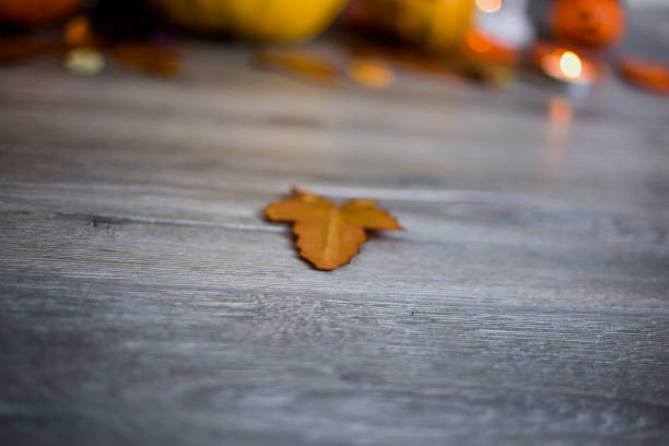 istock Halloween pumpkin head jack lantern on wooden background 1037079588