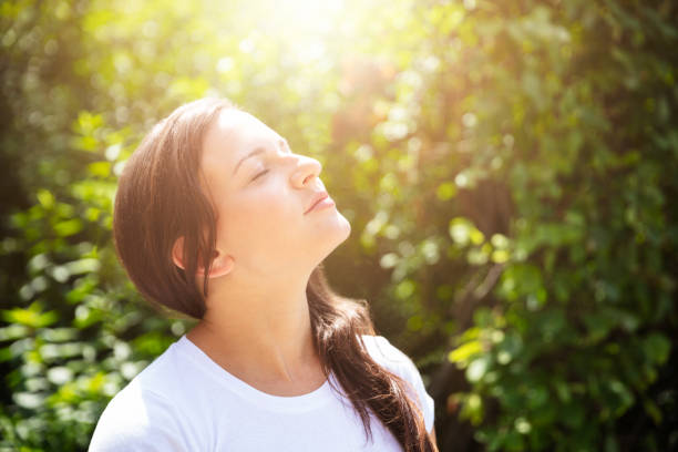 istock Woman Closing Her Eyes 1037080380